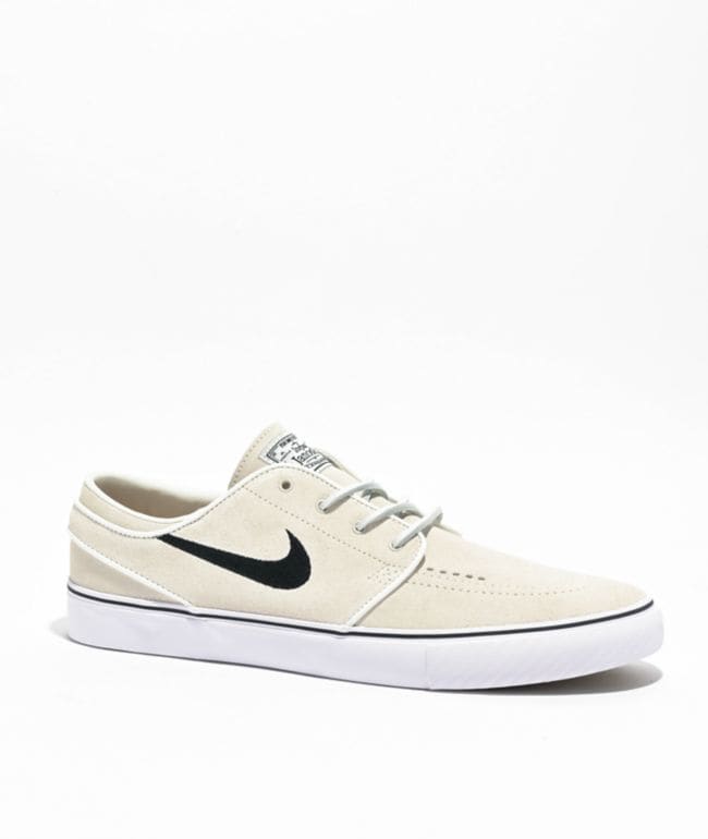 Zapatilla Nike SB Zoom Janoski OG+ de gamuza blanco hueso con swoosh negro y suela vulcanizada blanca